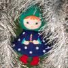 Elf de roba reversible fosforescent Lilliputiens Titti